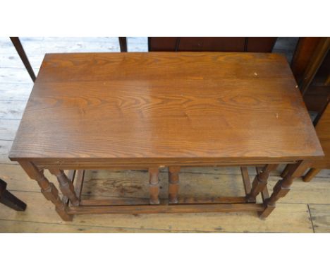 A modern gate leg table and a nest of three coffee tables