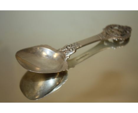A SILVER ARTS &amp; CRAFTS STYLE CADDY SPOON