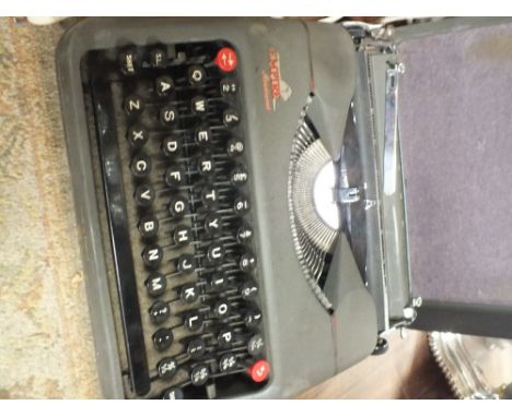A VINTAGE EMPIRE ARISTOCRAT TYPEWRITER