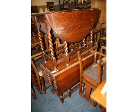 TWO VINTAGE OAK BARLEY TWIST GATE LEG TABLES