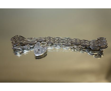 A HALLMARKED SILVER DESIGNER / RETRO STYLE GATE BRACELET