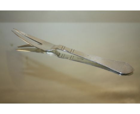 A GEORG JENSEN SILVER SERVING FORK