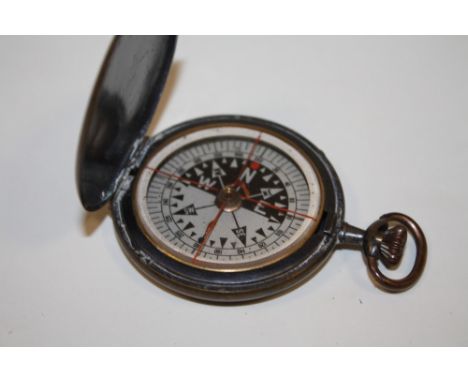 AN ANTIQUE MILITARY STYLE COMPASS