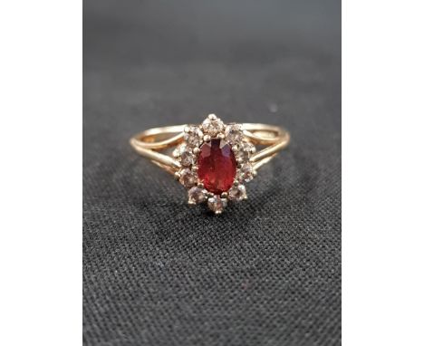 9CT GOLD GARNET AND CZ RING 