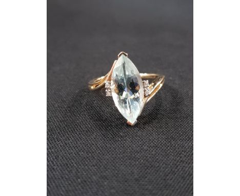 9 CT GOLD AQUA MARINE AND DIAMOND RING