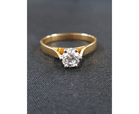 18CT GOLD AND DIAMOND SOLITAIRE RING