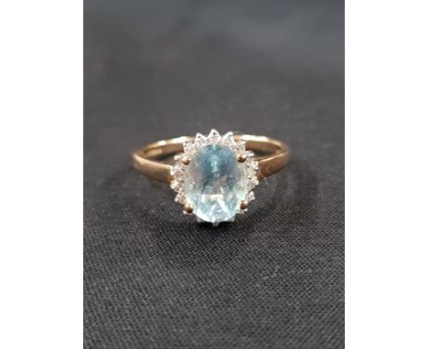 9CT GOLD AQUAMARINE AND DIAMOND RING
