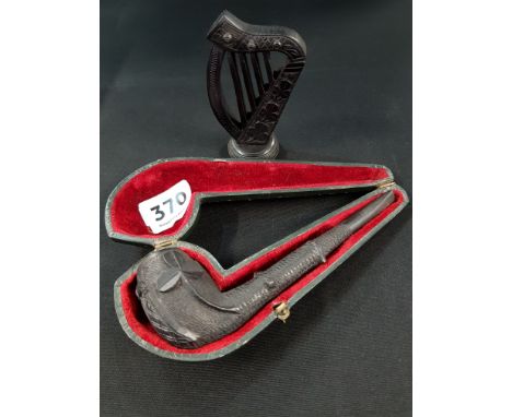 LATE VICTORIAN IRISH BOG OAK PIPE TOGETHER WITH A BOG OAK HARP