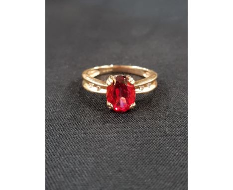 9CT GOLD RED STONE AND DIAMOND RING