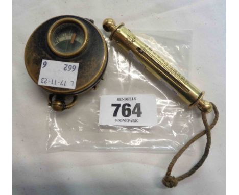 A WWI private purchase field compass - sold with a small brass spring balance