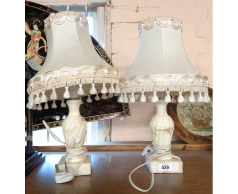 A pair of vintage alabaster table lamps of fluted form, both with shades