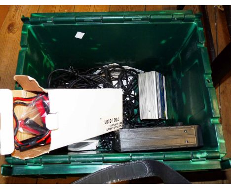 A green crate containing a quantity of items including Gemini wireless receiver, ring portable power source, etc.