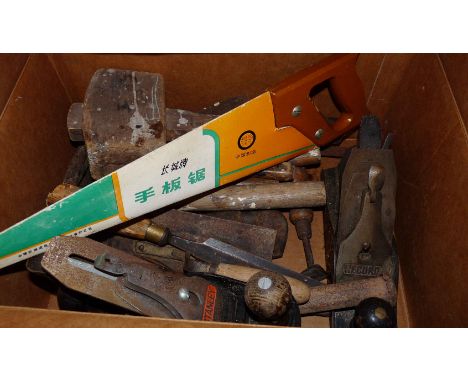 A box containing a quantity of woodworking tools including saws, Stanley and other planes, etc.