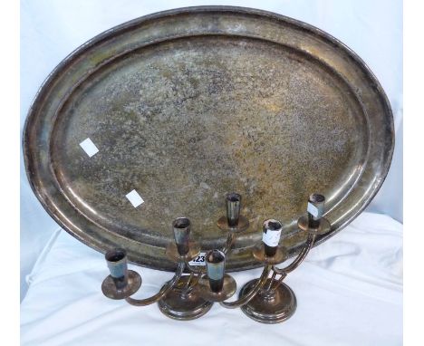 A large Elkington &amp; Co. silver plated oval tea tray (dents) - sold with a pair of short twin branch three light candelabr