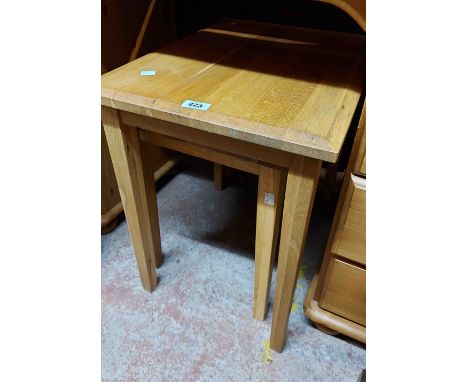 Two modern light oak nesting tables - sold with two other low tables