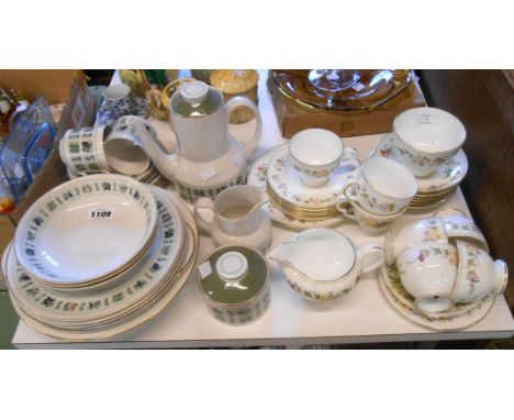 A quantity of Wedgwood bone china teaware in the Mirabelle pattern including cups and saucers, milk, sugar, etc. - sold with 