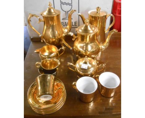 A quantity of Royal Worcester oven to tableware china with gold lustre finish - sold with a gold plated metal tea set