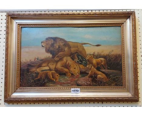 A vintage gilt framed oil on board, depicting a pride of lions