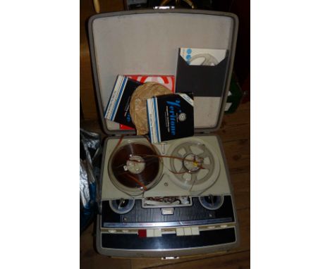 A vintage Stellaphone reel to reel tape recorder with a quantity of tapes