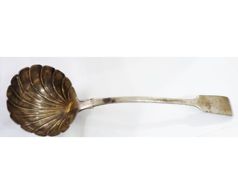 An early Victorian silver fiddle pattern soup ladle with shell pattern bowl - London 1842