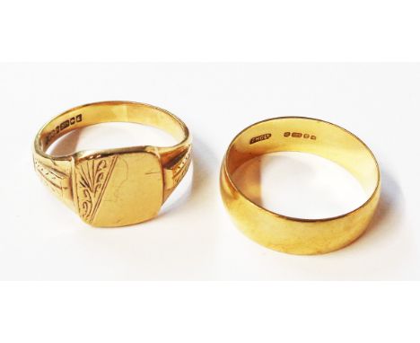 A 9ct. gold gentleman's signet ring - sold with a 9ct. gold wedding band - size W 1/2 and W respectively