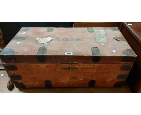 A 72cm vintage stained pine and iron bound lift-top trunk with internal candle box - sold with an antique deed box with peris