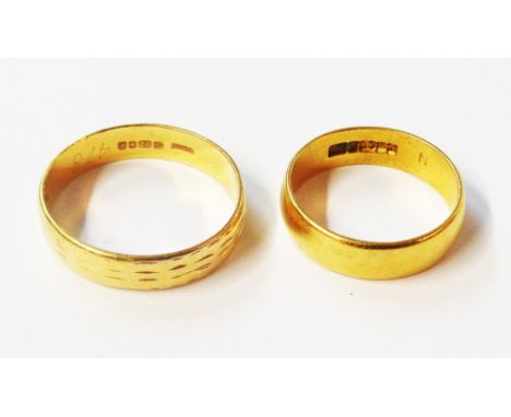 Two vintage 22ct. gold wedding bands - size R and L 1/2 respectively