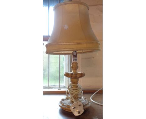 A vintage plaster table lamp and shade