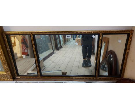 A 1.1m vintage gilt and ebonised lined framed triple plate wall mirror - minor loss