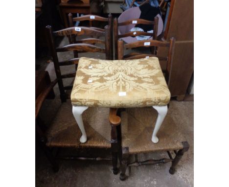 A harlequin set of four old oak framed ladder back Lancashire chairs comprising three standard and one carver - sold with a w