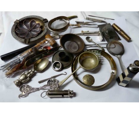 A bag containing a collection of metal and other items including cork screws, small opium pipe, etc.