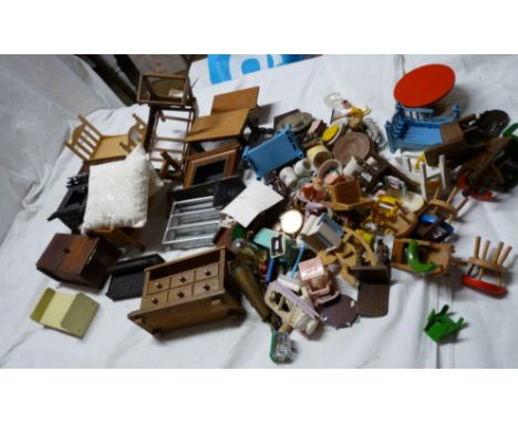 A bag containing a collection of vintage and later dolls' house furniture and accessories