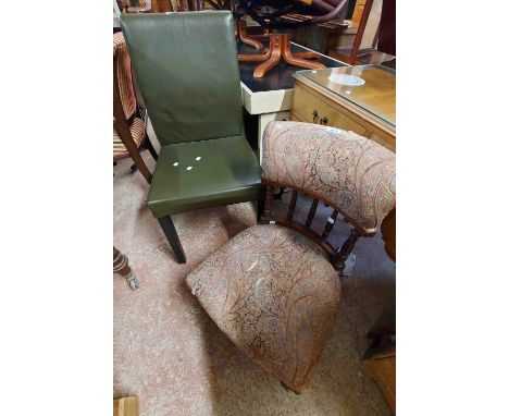 An Edwardian stained walnut framed low spindle back boudoir chair, set on turned front legs and casters - sold with an old nu