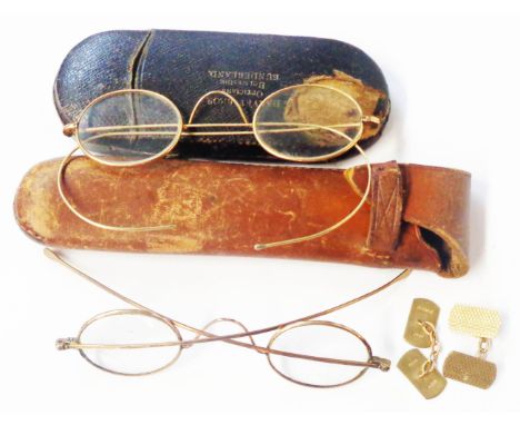 A pair of old marked 375 yellow metal framed spectacles - sold with another pair of yellow metal framed spectacles (both case