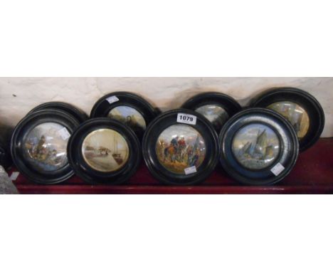 Seven 19th Century Prattware pot lids set in ebonised circular frames - sold with a similarly framed photographic print, depi