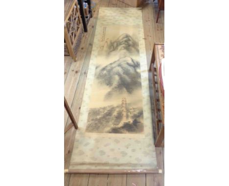 A vintage Oriental paper scroll, depicting mountains, encased in wooden box