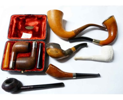 A bag containing a quantity of old pipes including silver mounted, cherry wood, etc. - sold with a cased silver mounted pipe 