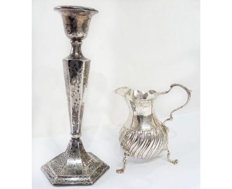 A late Victorian silver baluster cream jug, set on triple paw pattern feet - London 1891 - sold with a 17.5cm high silver can