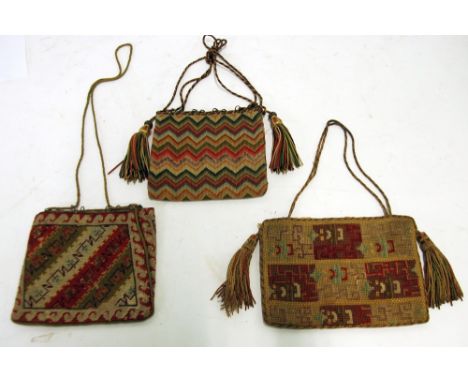 THREE NINETEENTH CENTURY NEEDLEWORK TAPESTRY HANDBAG, with cord straps, two with tasselled decoration, 6" and 7" wide (3) 