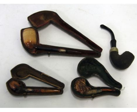 SIMPLE FEMALE HEAD CARVED SMALL MEERSCHAUM PIPE, with silver collar and amber stem in plush lined morocco case, ANOTHER OF BI