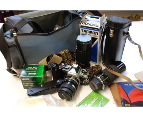 NIKON F.E. ROLL FILM S.L.R. CAMERA, fitted with Nikon Zoom-Nikkor lens - 35-70mm 1:3.3-4.5, RELATED INSTRUCTION MANUAL, toget