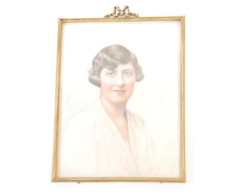 F.W. SCHMIDT OF MANCHESTER, MINIATURE ON IVORY, rectangular, Portrait of a lady, unsigned, in brass frame, 4 1/2" x 3 1/4" (1