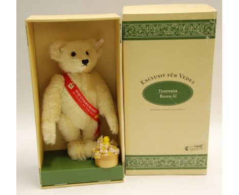 MARGARET STEIFF, BOXED BLOND PLUSH TEDDY BEAR COMMEMORATIVE OF 90 YEARS, limited edition No. 484/6000, depicted wearing red s