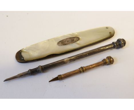 VICTORIAN GILT METAL RETRACTABLE TOOTH PICK, with red paste set top, A VICTORIAN SILVER FOLIATE ENGRAVED SLIM PROPELLING PENC