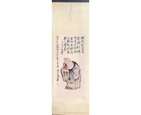A Chinese silk mounted hand painted scroll of Shou Lao, W. 62cm, L. 198cm.