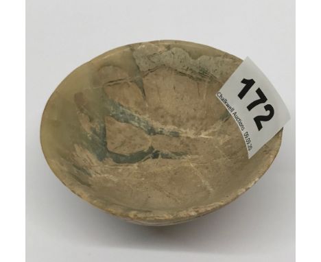 A Chinese archaic form jade bowl, Dia. 8.5cm, D. 4cm.