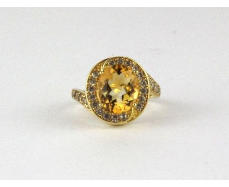 A 925 silver gilt citrine set ring.