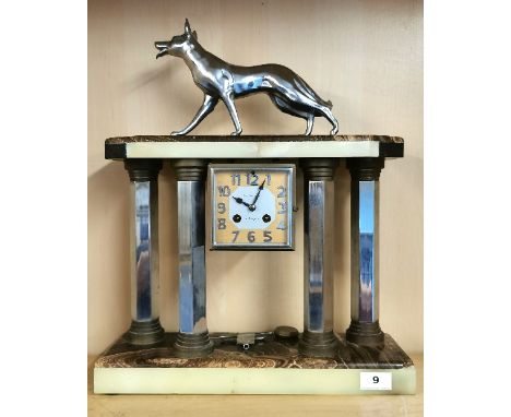 A large Desoleil Le Portel Art Deco marble and chromed mantle clock mounted with a dog , H. 48cm. Base W. 40cm. Condition: sl