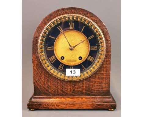 An oak cased Wales and McCulloh, London striking mantle clock, H. 29cm. Condition: understood to be in working order.