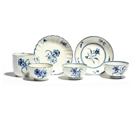 A Worcester blue and white trio  c.1770-80, the fluted forms painted with the Gilliflower pattern, a teabowl and saucer paint